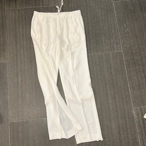 Beautiful like silk dress pant with open bottom super comfy and great looking!